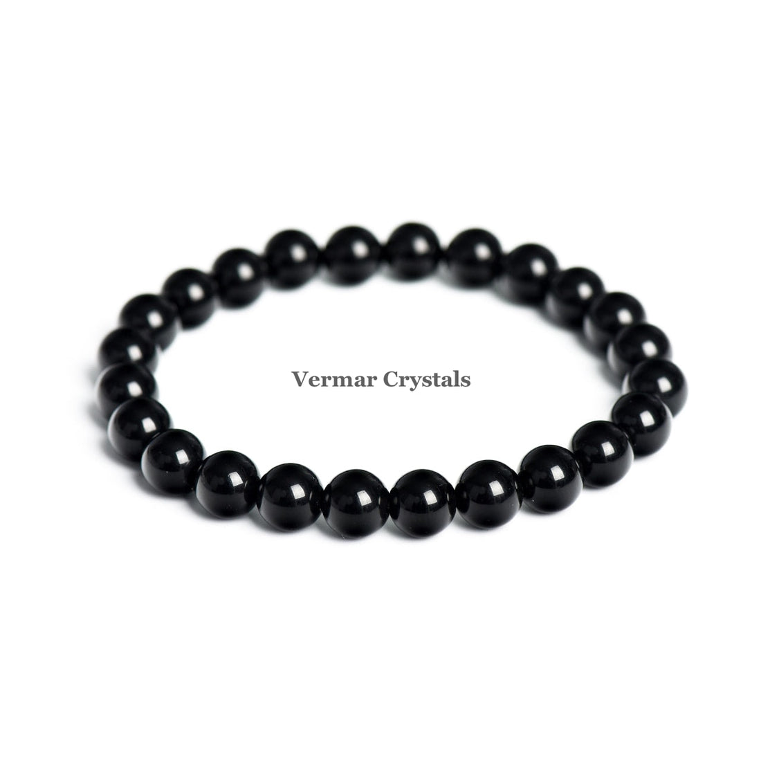 Stretchy bracelet made of polished 8mm black obsidian round beads arranged in a circle on a white background