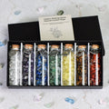 Chakra Healing Chip Stone Wishing Bottle Set with seven glass vials of colorful natural crystal chips in black box