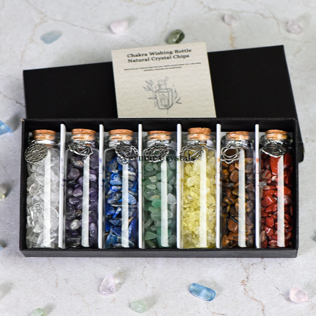 Chakra Healing Chip Stone Wishing Bottle Set with seven glass vials of colorful natural crystal chips in black box