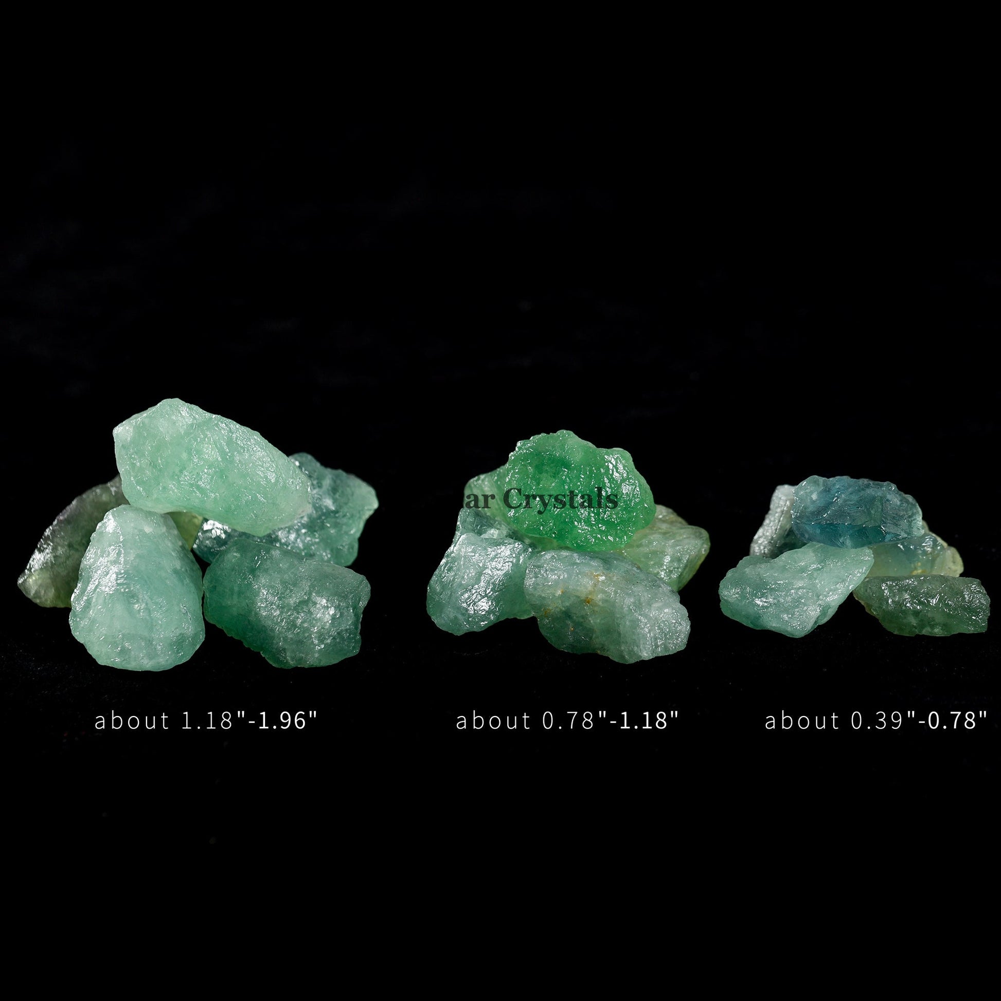 Three groups of rough green fluorite crystal stones of varying sizes on a black background with size labels