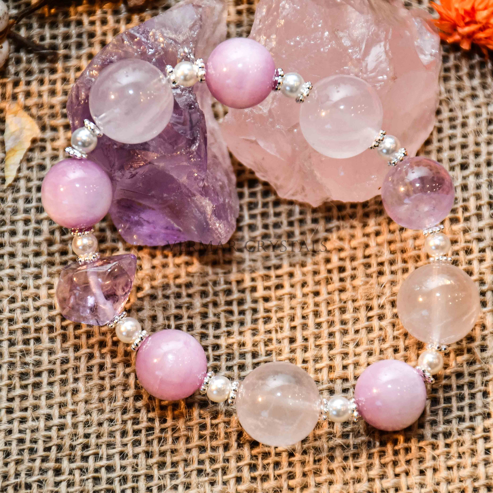 Provence Garden bracelet with round amethyst and lepidolite beads on natural burlap with crystals background