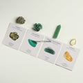 Wealth and Abundance crystal set with pyrite, malachite, green aventurine, and citrine stones on white cards